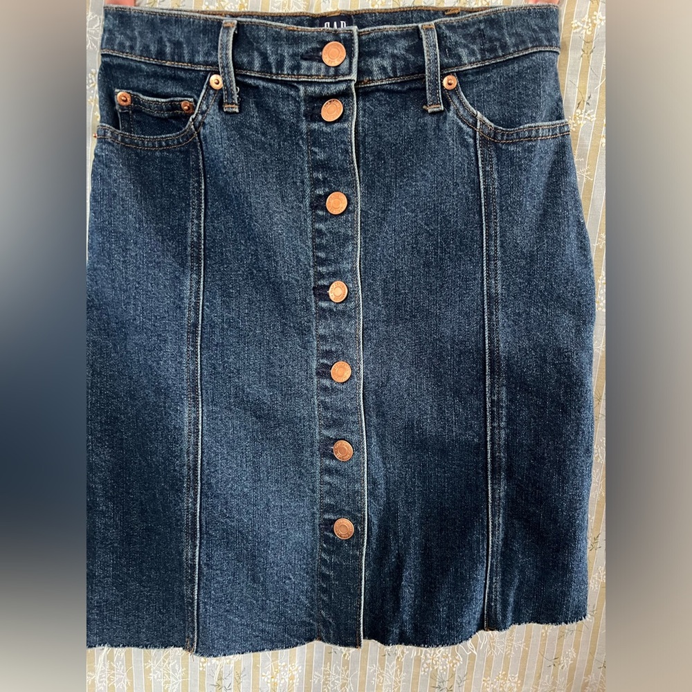 Jean skirt. Buttons in front make it extra adorable.